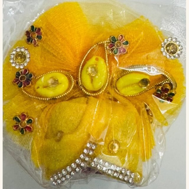Yellow Laddu Gopal Mukut with intricate stone, bead, and floral embellishments
