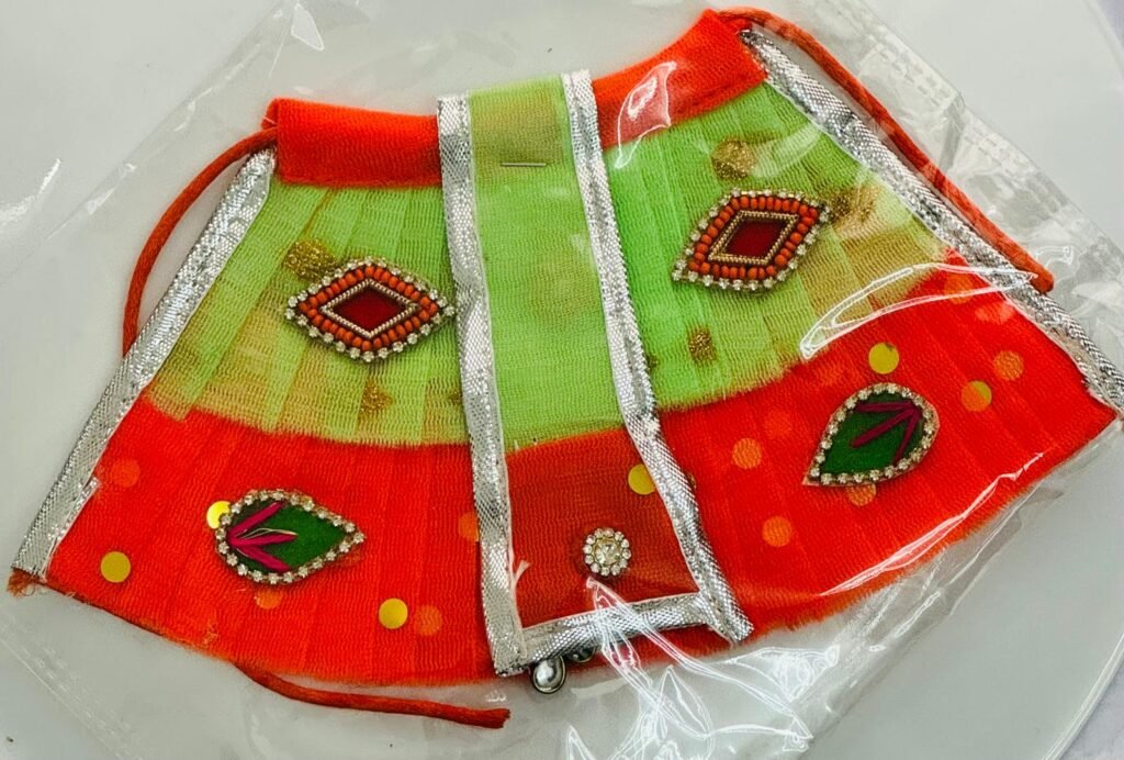 Elegant Radha Rani lehenga with floral accents
