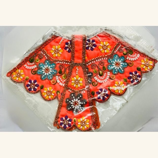 Pearl-decorated Radha Rani lehenga with traditional motifs