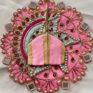 Pink Ladoo Gopal dress in Size 2 with red stones, pearl lace, golden embroidery, mirror accents, and a pastel blue arc design.