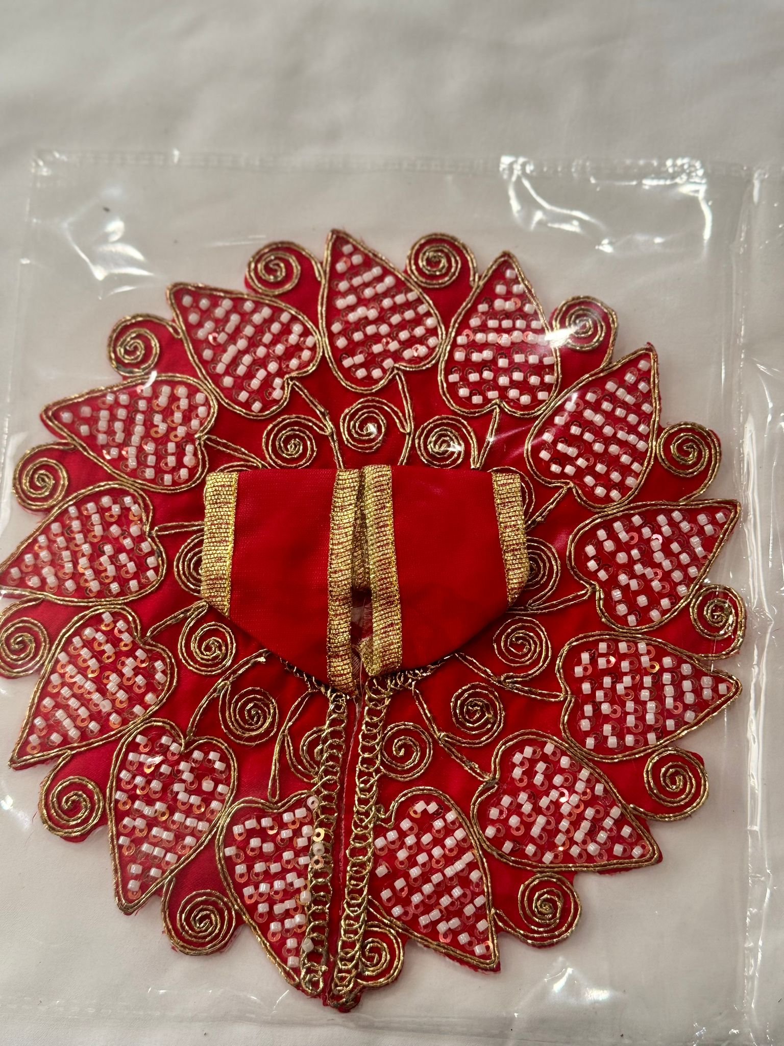 Laddu Gopal Dress Size 3 in red with heart-shaped leaf design, white beadwork, and golden chain