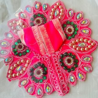 Red Laddu Gopal dress with green stone circles, golden pearls, and shimmering mirror embroidery