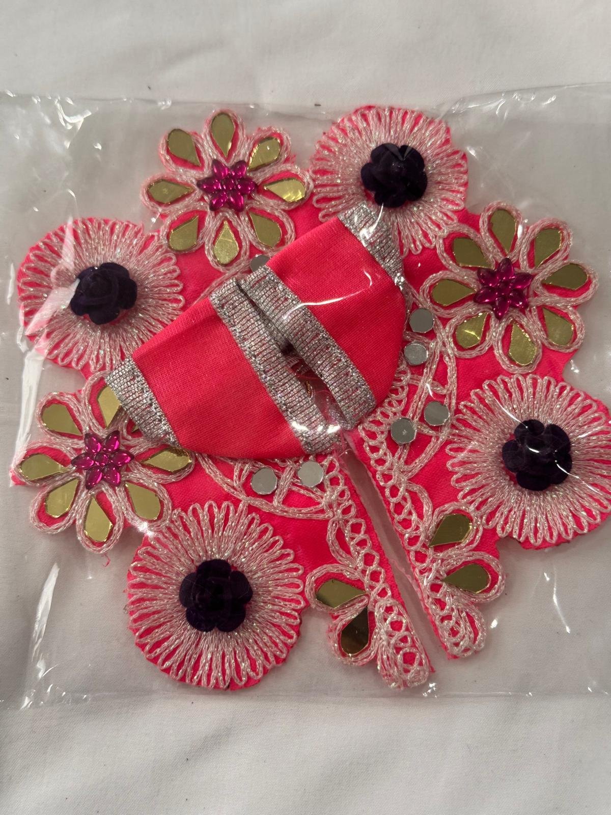 Size 1 Ladoo Gopal Dress in bright pink with silver lace, golden mirror embroidery, and purple flower detailing