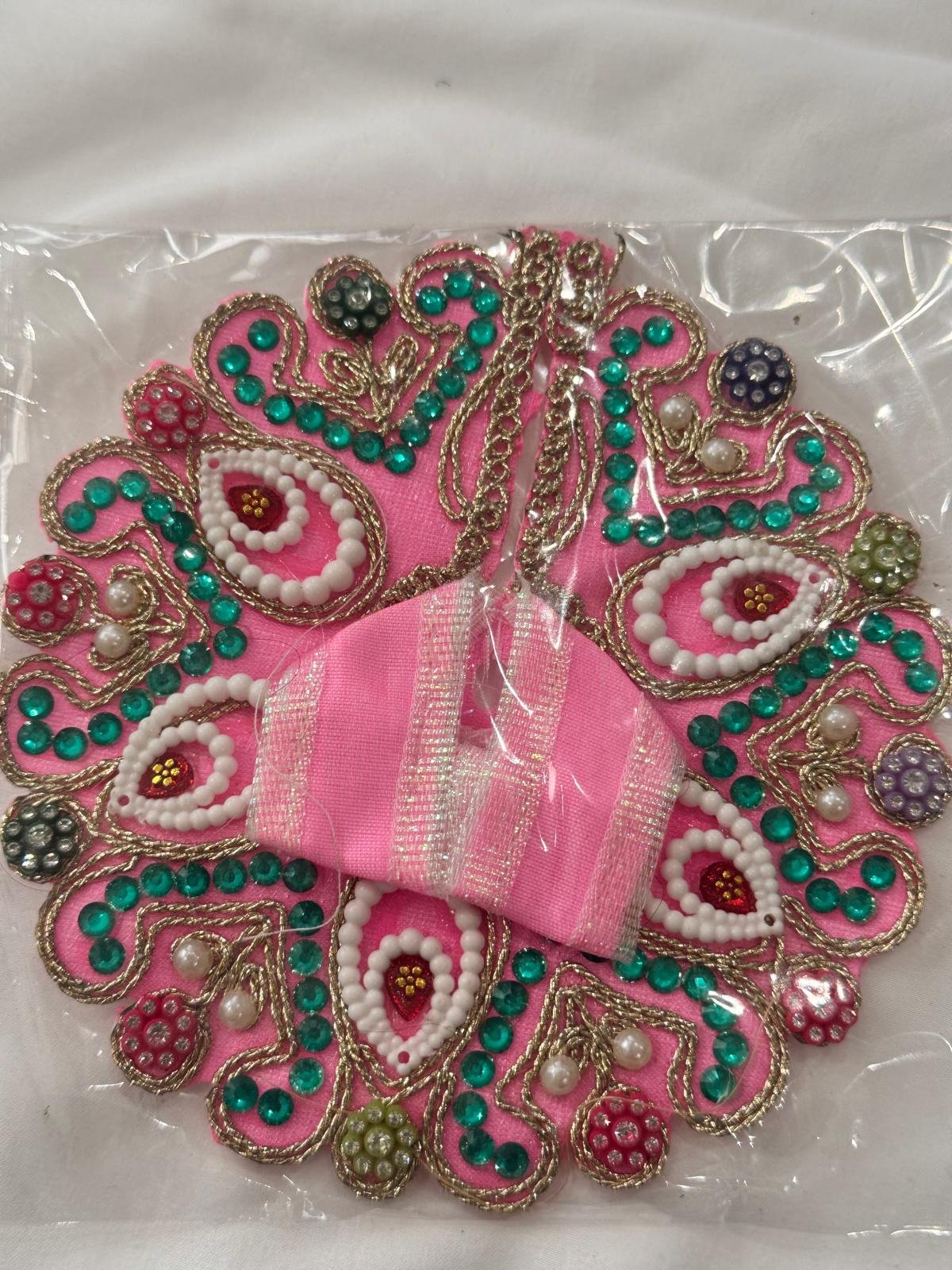 Alt Text: Size 1 baby pink Laddu Gopal dress with multicolor beadwork, green stones, and white pearl embroidery