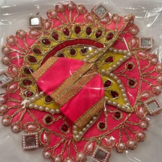 Size 1 Laddu Gopal dress in pink with golden zari, red stones, pearl and mirror embellishments