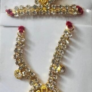 Laddu Gopal accessory set featuring a golden floral filigree mukut and matching necklace adorned with clear rhinestones.