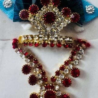 Laddu Gopal mukut and mala set with peacock-colored satin petals, ruby red stones, and white crystal highlights