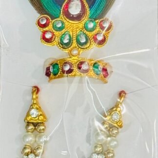 Laddu Gopal accessory set with a golden mukut featuring a peacock feather and matching pearl mala with red and white floral stones