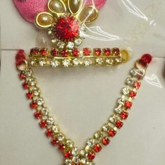 Laddu Gopal accessory set featuring red and white stones with a pink and blue crown and red centerpiece