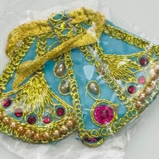 Blue Radha Rani dress with golden peacock embroidery, decorative lace, and multicolored stones, displayed in clear packaging.