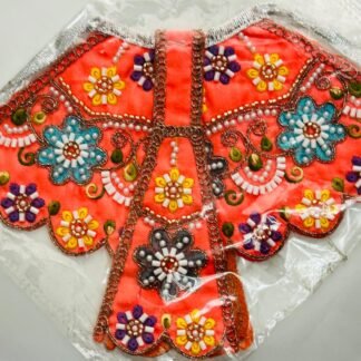 Pearl-decorated Radha Rani lehenga with traditional motifs