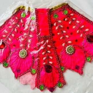 Bright pink Radha Rani dress with petal design, pearl accents, and red-green stones