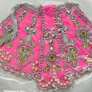 Pink Radha Rani Lehenga with silver mirror work, pearl beads, and green-yellow stones